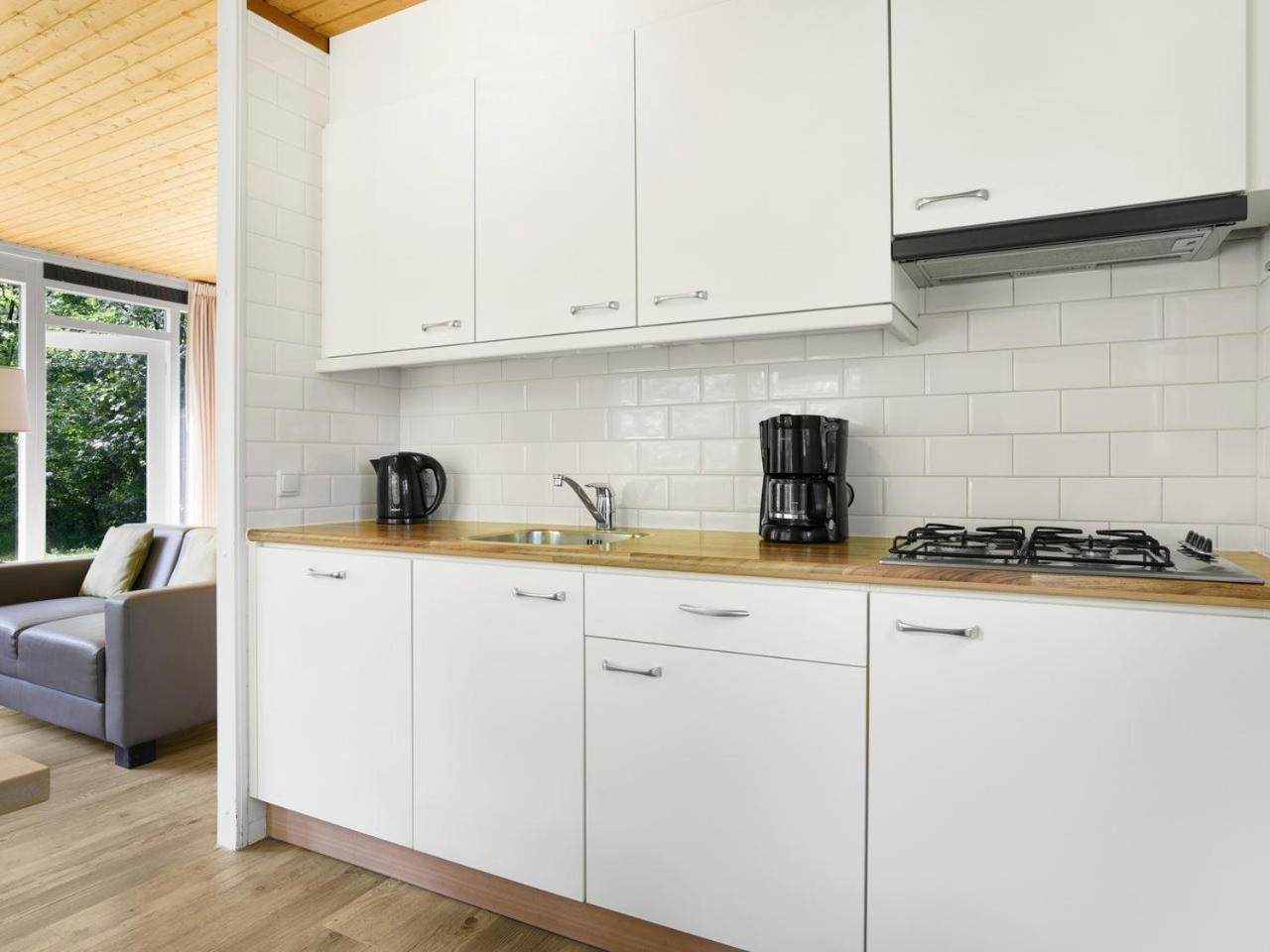 Luxury 4-Person Bungalow In The Holiday Park Landal Twenhaarsveld Хльтен Номер фото